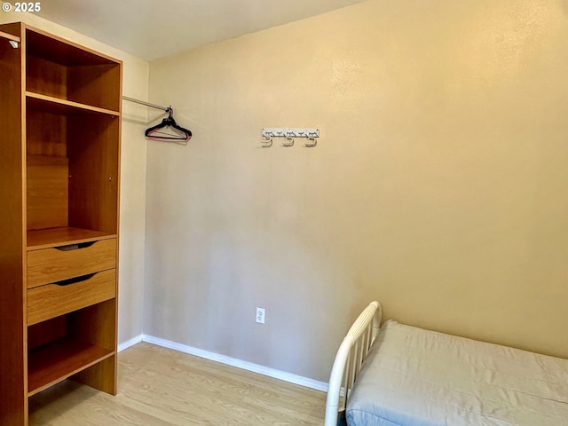 26230 Sandlake Rd, Cloverdale, OR 97112 - unfurnished bedroom with light wood-type flooring and baseboards