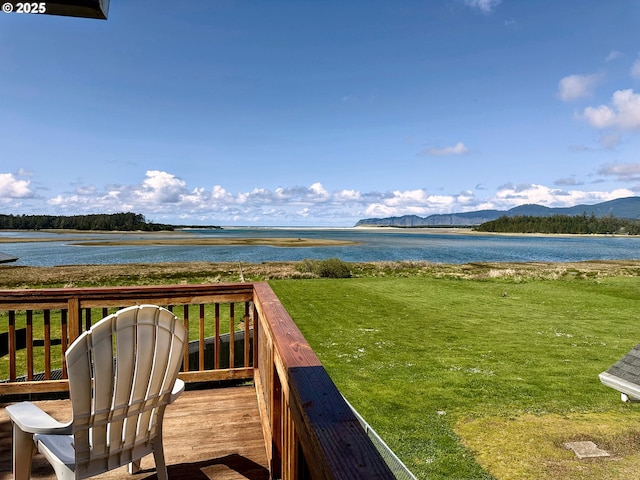 26230 Sandlake Rd, Cloverdale, OR 97112 - wooden terrace with a water and mountain view and a lawn