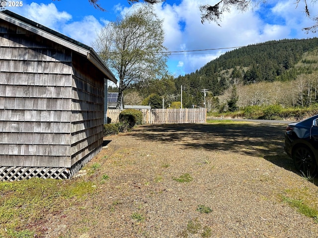 26230 Sandlake Rd, Cloverdale, OR 97112 - view of yard with a mountain view and fence