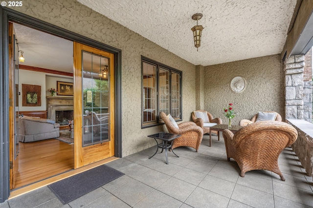 6633 SE 29th Ave, Portland, OR 97202 - exterior space with tile patterned flooring, a textured ceiling, and plenty of natural light