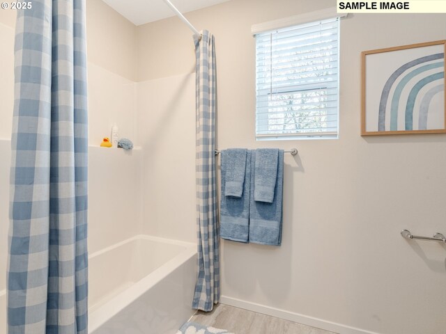 unfurnished bedroom with light colored carpet and a closet