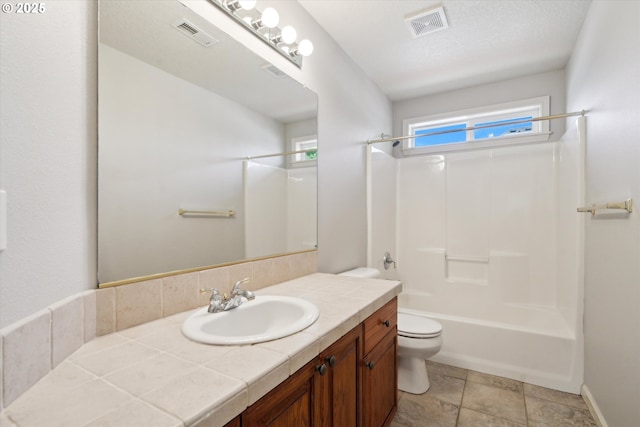 13733 NW Trevino St, Portland, OR 97229 - bathroom featuring toilet, vanity, and shower / bath combination