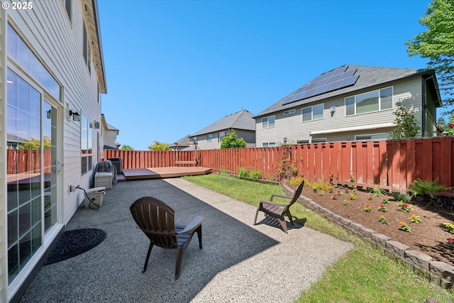 13733 NW Trevino St, Portland, OR 97229 - fenced backyard with a patio and a wooden deck