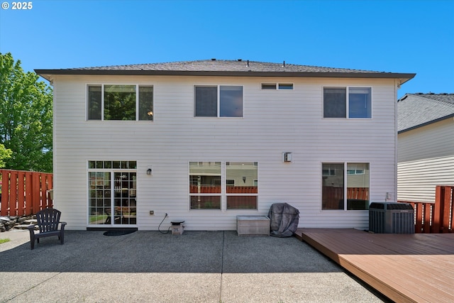 13733 NW Trevino St, Portland, OR 97229 - rear view of house with central AC unit, a deck, and a patio