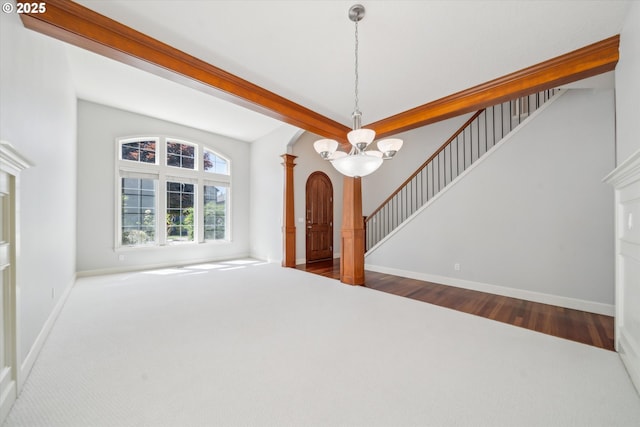 13733 NW Trevino St, Portland, OR 97229 - unfurnished living room featuring carpet flooring, a chandelier, stairway, and baseboards