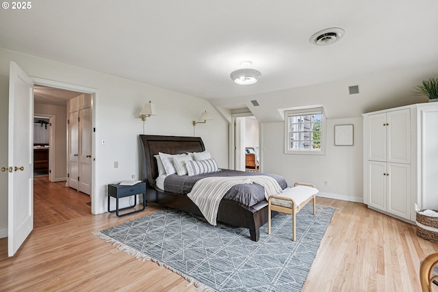4317 SW Bernard Dr, Portland, OR 97239 - bedroom featuring light wood finished floors and baseboards