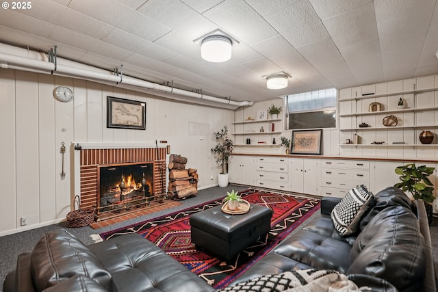 4317 SW Bernard Dr, Portland, OR 97239 - carpeted living area with a fireplace and baseboards