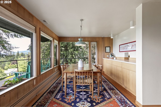 275 Sunset Dr, Eugene, OR 97403 - dining room featuring wooden walls and wood finished floors