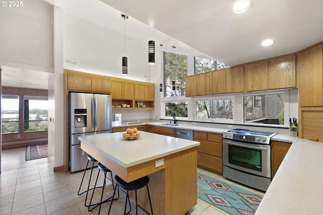 275 Sunset Dr, Eugene, OR 97403 - kitchen with stainless steel appliances, high vaulted ceiling, light countertops, a kitchen breakfast bar, and open shelves