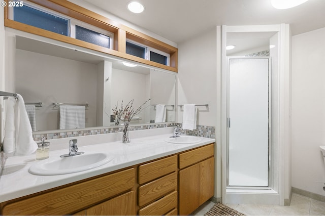 275 Sunset Dr, Eugene, OR 97403 - full bathroom with a shower stall, double vanity, and tile patterned flooring