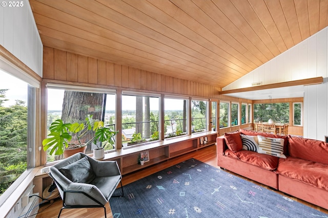 275 Sunset Dr, Eugene, OR 97403 - sunroom / solarium with lofted ceiling, wooden ceiling, plenty of natural light, wood walls, and wood finished floors