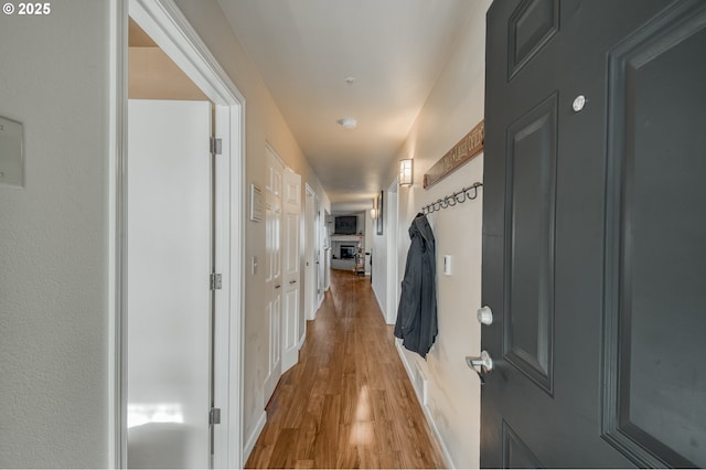 hallway featuring wood finished floors