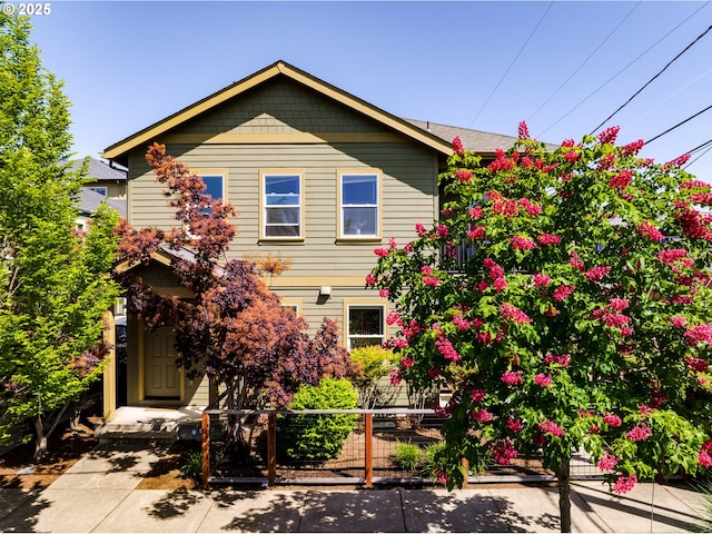 443/447 E 16th Ave, Eugene, OR 97401 - view of front of house with fence