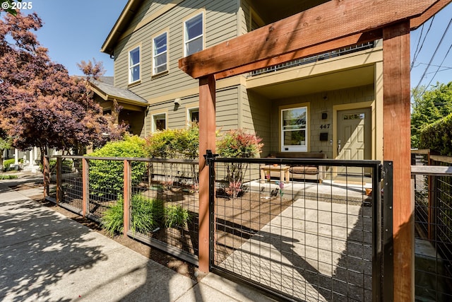 443/447 E 16th Ave, Eugene, OR 97401 - view of front of house with a gate and a fenced front yard