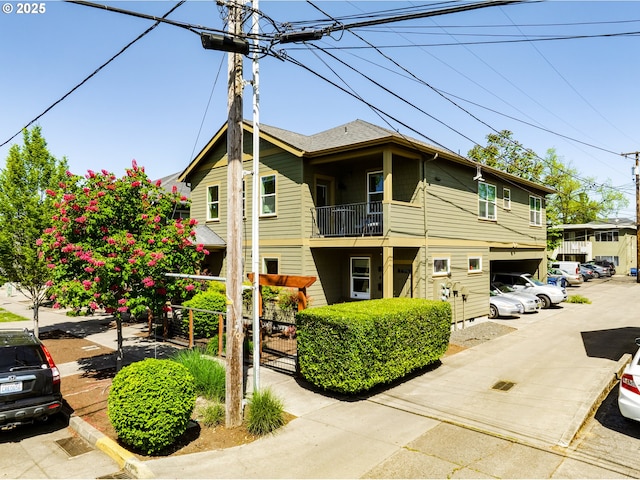 443/447 E 16th Ave, Eugene, OR 97401 - view of property exterior with a balcony