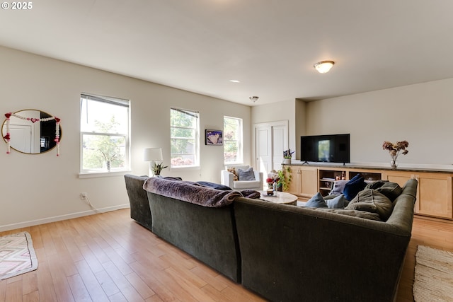 443/447 E 16th Ave, Eugene, OR 97401 - living area featuring baseboards and light wood-style flooring