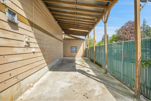 view of patio / terrace featuring fence