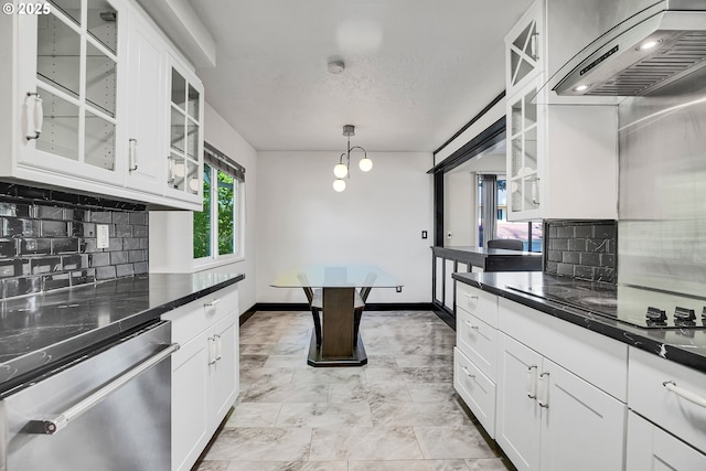 kitchen featuring white cabinetry, tasteful backsplash, wall chimney exhaust hood, and dishwasher