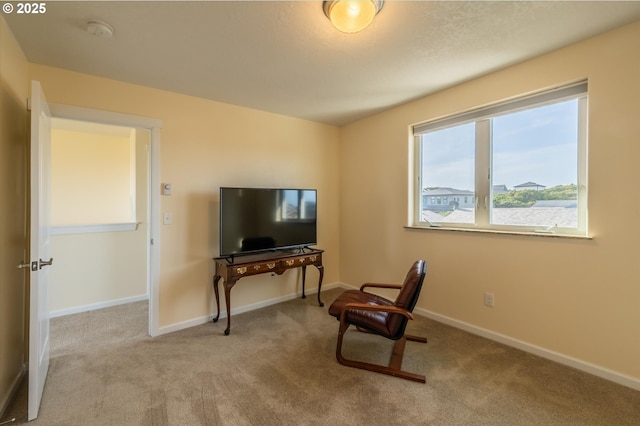 757 Newport Ave SW, Bandon, OR 97411 - sitting room featuring carpet floors and baseboards