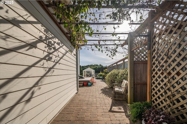 757 Newport Ave SW, Bandon, OR 97411 - view of side of home with fence and a patio