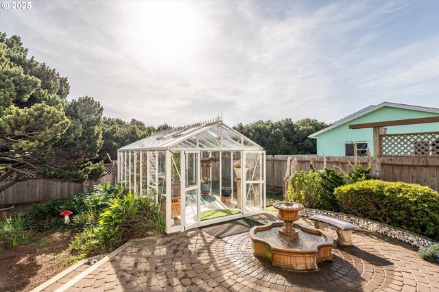 757 Newport Ave SW, Bandon, OR 97411 - view of patio / terrace with an exterior structure, an outbuilding, and a fenced backyard