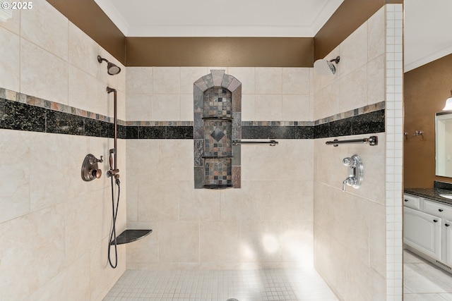 full bathroom featuring a tile shower, vanity, and ornamental molding