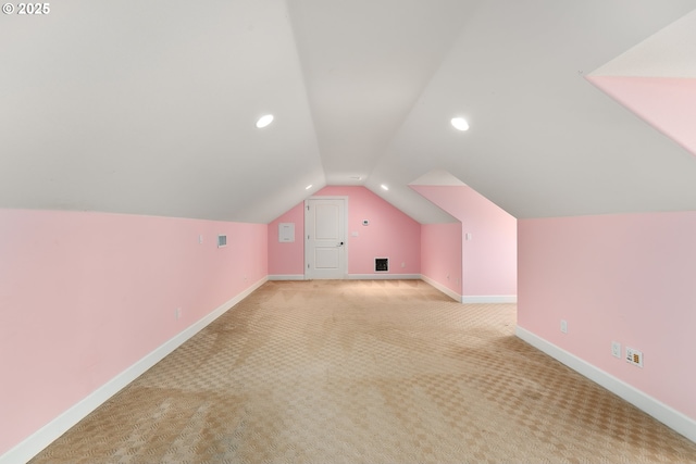 additional living space with lofted ceiling, baseboards, carpet, and recessed lighting