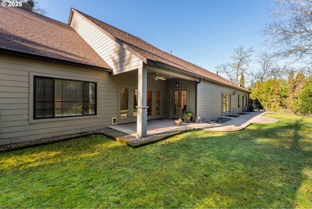 245 Winchester Creek Ave, Winchester, OR 97495 - back of property featuring french doors, a yard, a patio area, ceiling fan, and a shingled roof