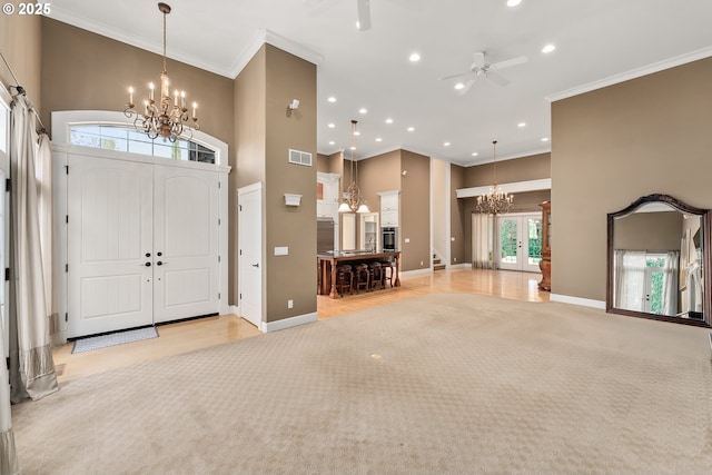 245 Winchester Creek Ave, Winchester, OR 97495 - foyer with a chandelier, ornamental molding, recessed lighting, a ceiling fan, and a towering ceiling