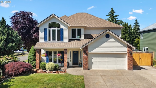 2855 NW Orchard Heights Ave, Albany, OR 97321 - traditional-style house featuring an attached garage, concrete driveway, brick siding, and a shingled roof