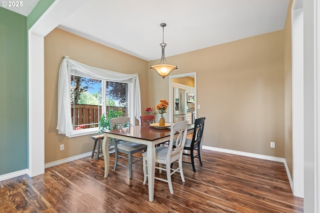 2855 NW Orchard Heights Ave, Albany, OR 97321 - dining room featuring dark wood-style floors and baseboards