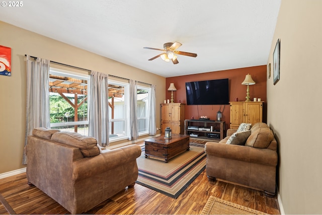 2855 NW Orchard Heights Ave, Albany, OR 97321 - living room featuring ceiling fan, wood finished floors, and baseboards
