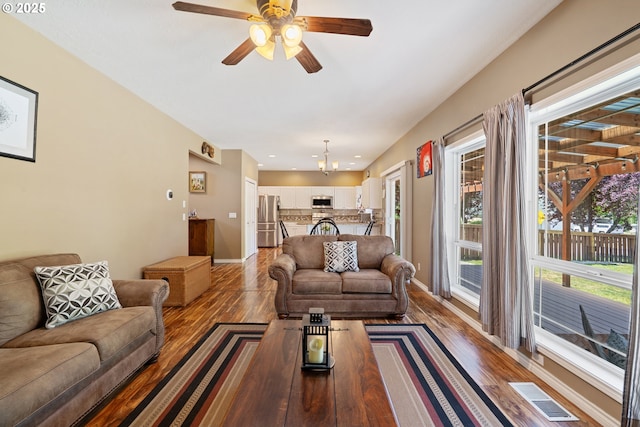 2855 NW Orchard Heights Ave, Albany, OR 97321 - living area featuring wood finished floors, a ceiling fan, recessed lighting, and baseboards