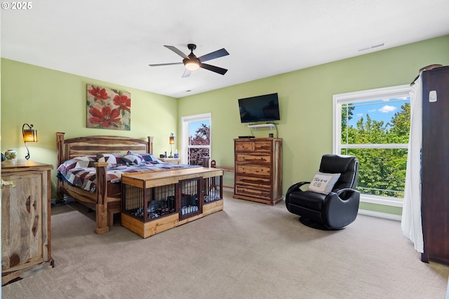 2855 NW Orchard Heights Ave, Albany, OR 97321 - bedroom with multiple windows, carpet, and a ceiling fan