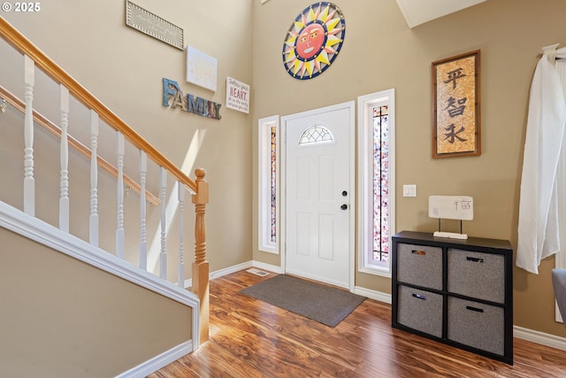 2855 NW Orchard Heights Ave, Albany, OR 97321 - foyer featuring wood finished floors, baseboards, stairway, and a towering ceiling