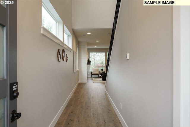 4688 NW 71st Ave, Camas, WA 98607 - hallway with baseboards, wood finished floors, and recessed lighting