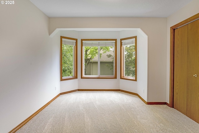 17811 NW Gilbert Ln, Portland, OR 97229 - carpeted spare room featuring baseboards