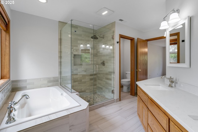 17811 NW Gilbert Ln, Portland, OR 97229 - bathroom featuring a shower stall, a bath, toilet, and double vanity