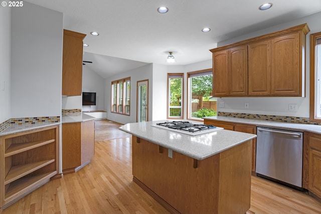 17811 NW Gilbert Ln, Portland, OR 97229 - kitchen with dishwasher, white gas cooktop, recessed lighting, light wood finished floors, and a kitchen island