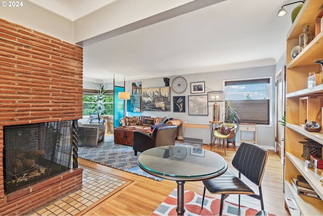 2025 SE Caruthers St Unit 19, Portland, OR 97214 - sitting room featuring wood finished floors and baseboards
