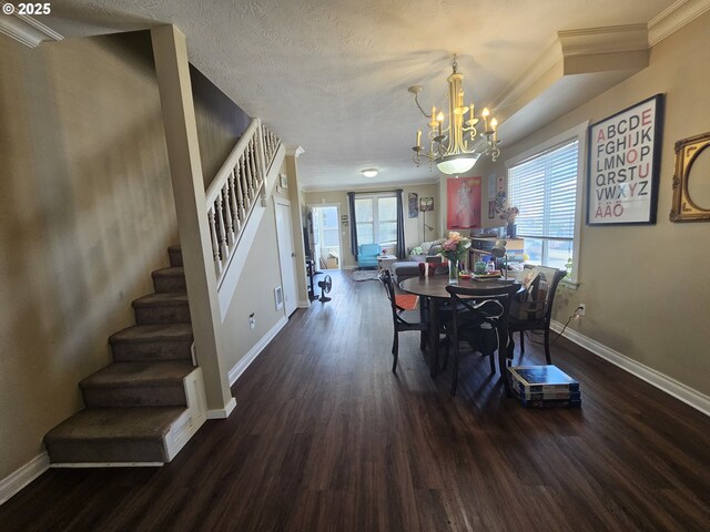 110 2nd St, Astoria, OR 97103 - dining area with stairs, wood finished floors, plenty of natural light, ornamental molding, and a textured ceiling