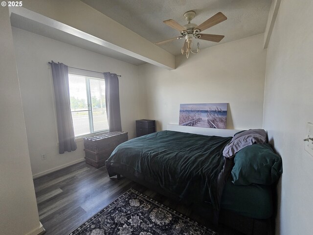 110 2nd St, Astoria, OR 97103 - bedroom with wood finished floors, baseboards, and a ceiling fan