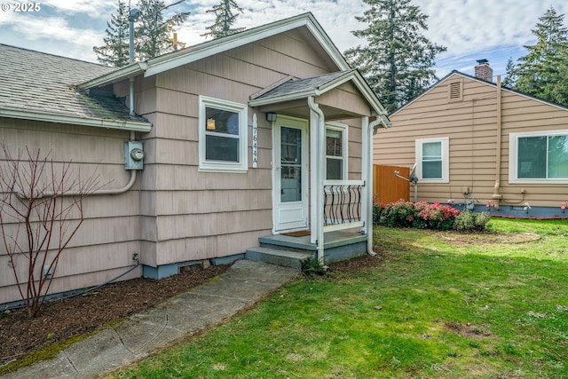 7644 SE Crystal Springs Blvd, Portland, OR 97206 - entrance to property with a lawn and roof with shingles