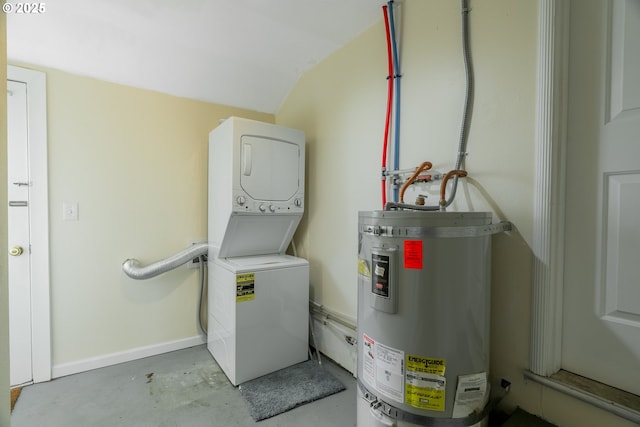 7644 SE Crystal Springs Blvd, Portland, OR 97206 - laundry area with strapped water heater, stacked washer / dryer, and baseboards