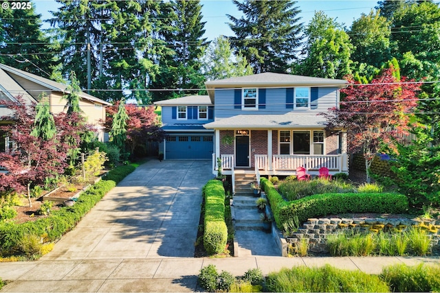 2760 SW Sylvania Ter, Portland, OR 97219 - view of front facade featuring concrete driveway, covered porch, an attached garage, and brick siding