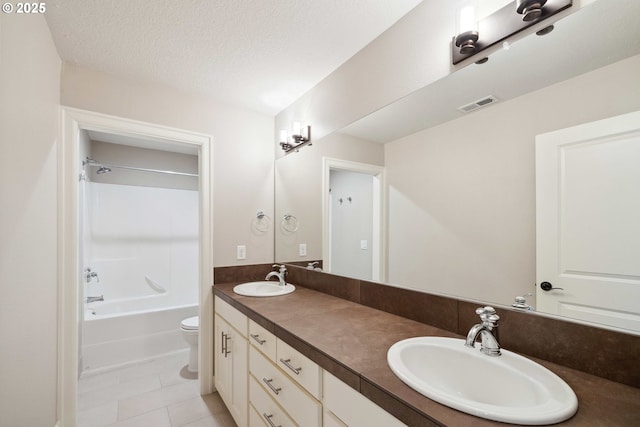 2760 SW Sylvania Ter, Portland, OR 97219 - full bath featuring double vanity, washtub / shower combination, and tile patterned floors