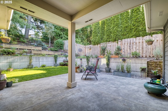 2760 SW Sylvania Ter, Portland, OR 97219 - fenced backyard with a patio area