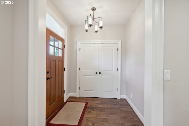 2760 SW Sylvania Ter, Portland, OR 97219 - entrance foyer featuring dark wood-style flooring and a chandelier