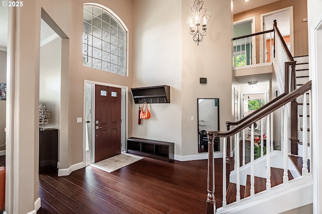 1406 NW Slocum Way, Portland, OR 97229 - foyer featuring a towering ceiling, stairway, hardwood / wood-style flooring, and a chandelier