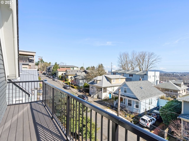 balcony featuring a residential view